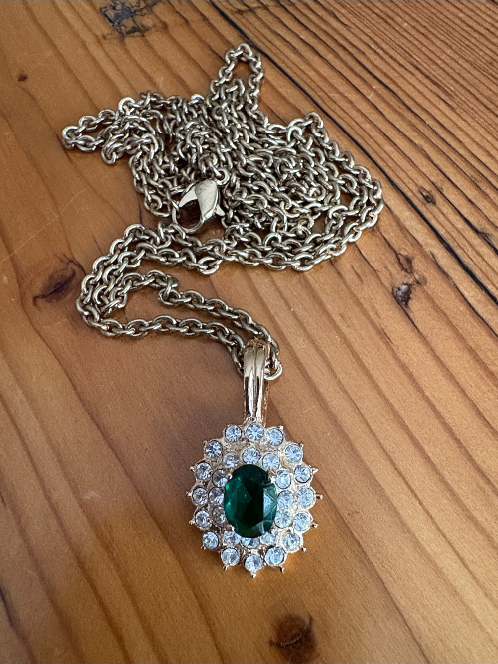 Gold-Tone Emerald Green Halo Pendant Necklace with Crystal Accents